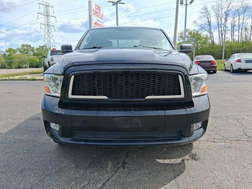 Black 2012 RAM 1500 Express 4x4 4dr Quad Cab 6.3 ft. SB Pickup