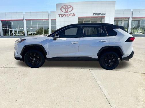 Wind Chill Pearl/Midnight Black Metallic 2024 Toyota RAV4 Hybrid SE