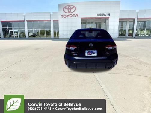 Midnight Black Metallic 2026 Toyota Corolla Hybrid SE