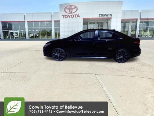 Midnight Black Metallic 2026 Toyota Corolla Hybrid SE