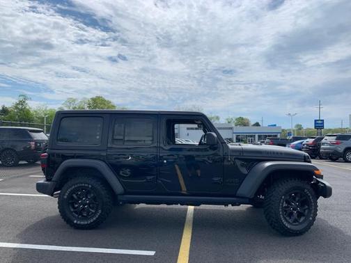 Photo 3 of 35 of 2021 Jeep Wrangler Unlimited Sport