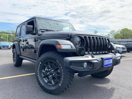 Photo 2 of 35 of 2021 Jeep Wrangler Unlimited Sport