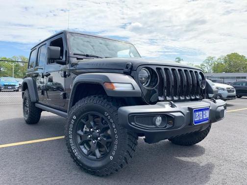 Photo 1 of 35 of 2021 Jeep Wrangler Unlimited Sport