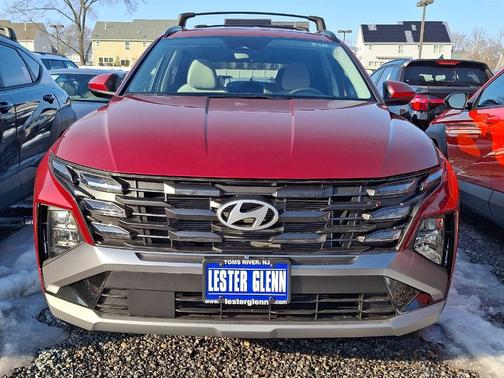 Red 2026 Hyundai TUCSON SEL