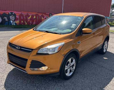 Sunset 2016 Ford Escape SE