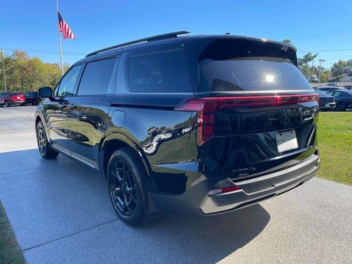 Aurora Black Pearl 2026 Kia Carnival Hybrid SX