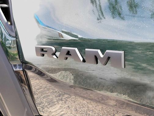 Serrano Green Metallic 2026 RAM 1500 RHO Crew Cab 4x4 5'7' Box