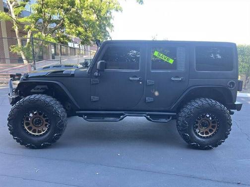 Black Clear Coat 2015 Jeep Wrangler Unlimited Sahara