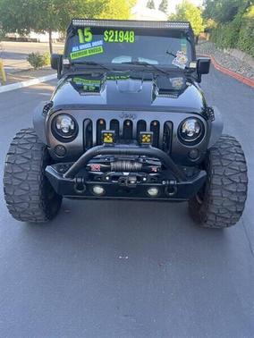 Black Clear Coat 2015 Jeep Wrangler Unlimited Sahara