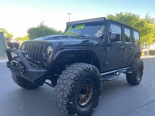 Black Clear Coat 2015 Jeep Wrangler Unlimited Sahara