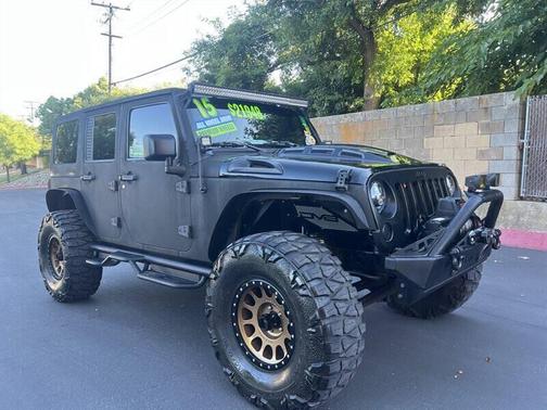 Black Clear Coat 2015 Jeep Wrangler Unlimited Sahara