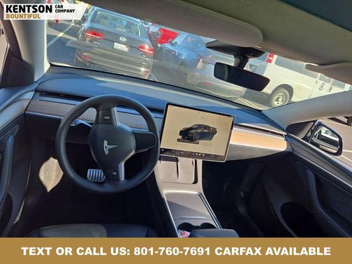 Solid Black 2023 Tesla Model Y Performance Dual Motor All-Wheel Drive