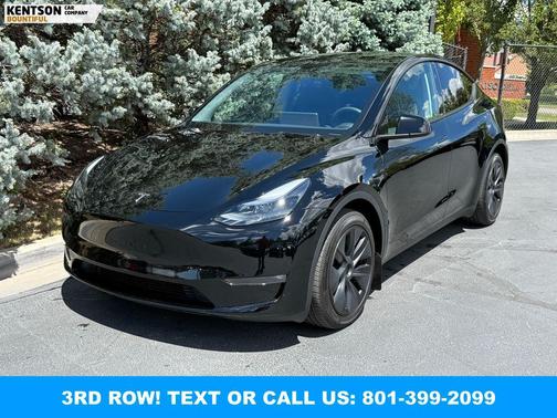 Solid Black 2025 Tesla Model Y Long Range Dual Motor All-Wheel Drive