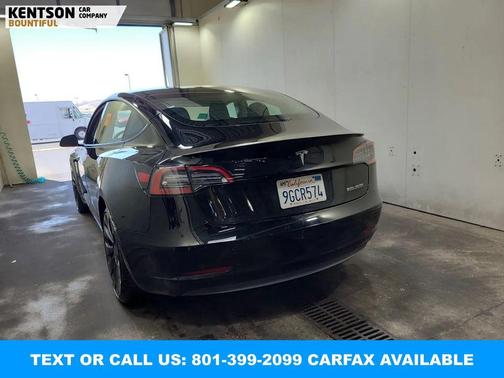 Solid Black 2023 Tesla Model 3 Performance