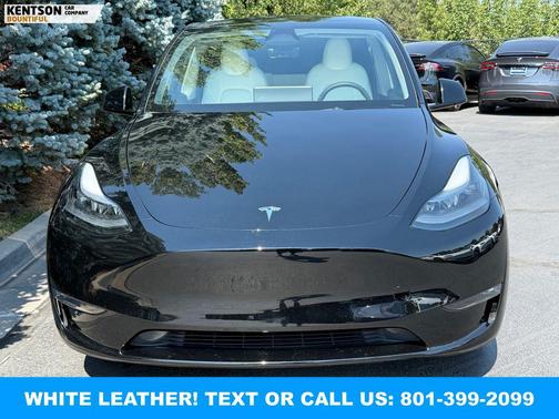 Solid Black 2024 Tesla Model Y Performance Dual Motor All-Wheel Drive