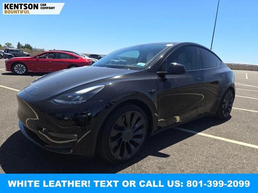 Solid Black 2024 Tesla Model Y Performance Dual Motor All-Wheel Drive