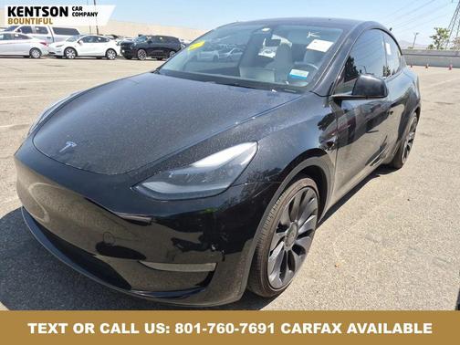 Solid Black 2024 Tesla Model Y Performance Dual Motor All-Wheel Drive