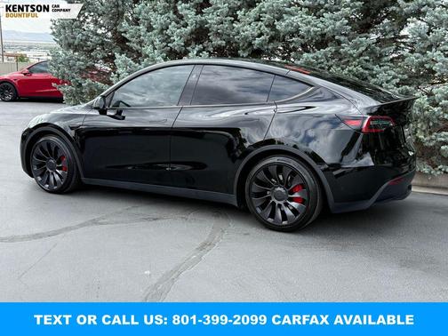 Solid Black 2024 Tesla Model Y Performance Dual Motor All-Wheel Drive