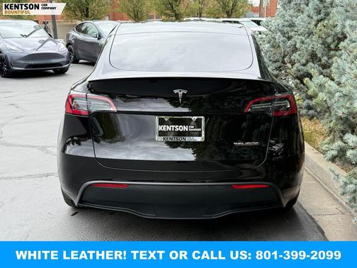 Solid Black 2023 Tesla Model Y Performance Dual Motor All-Wheel Drive