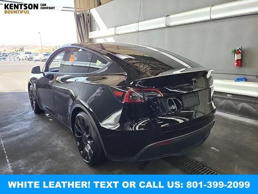 Solid Black 2023 Tesla Model Y Performance Dual Motor All-Wheel Drive