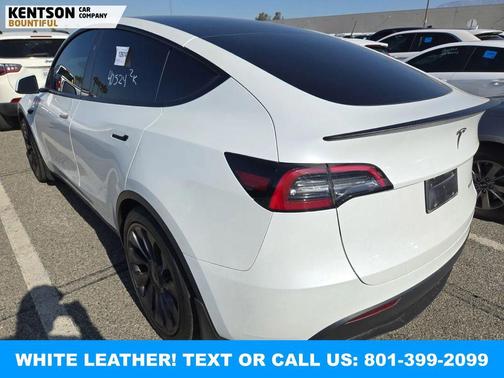 Pearl White Multi-Coat 2024 Tesla Model Y Performance Dual Motor All-Wheel Drive