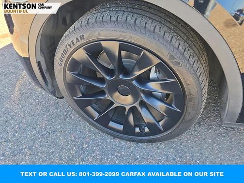 Solid Black 2024 Tesla Model Y Long Range Dual Motor All-Wheel Drive