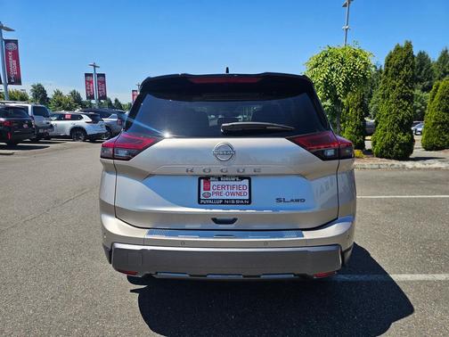 Champagne Silver Metallic/Super Black 2024 Nissan Rogue SL
