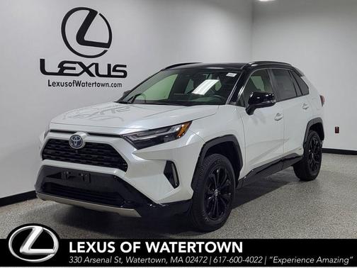 Wind Chill Pearl/Midnight Black Metallic 2023 Toyota RAV4 Hybrid SE