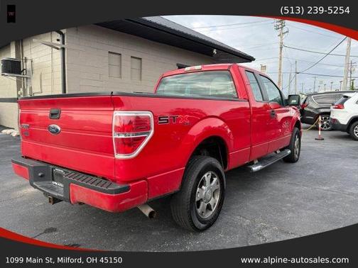 Red 2010 Ford F-150 STX SuperCab