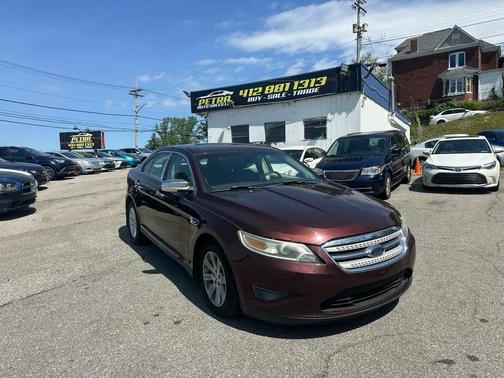 Maroon 2010 Ford Taurus SE