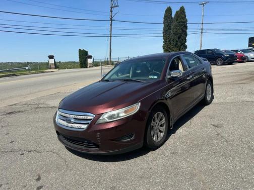 Maroon 2010 Ford Taurus SE
