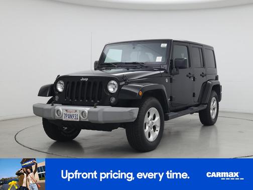 Black 2015 Jeep Wrangler Unlimited Sahara
