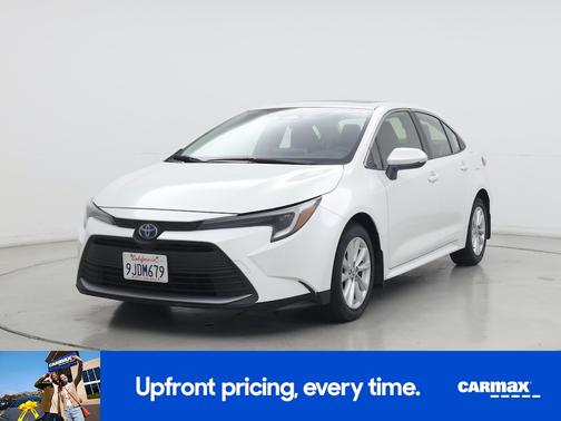 White 2024 Toyota Corolla Hybrid XLE