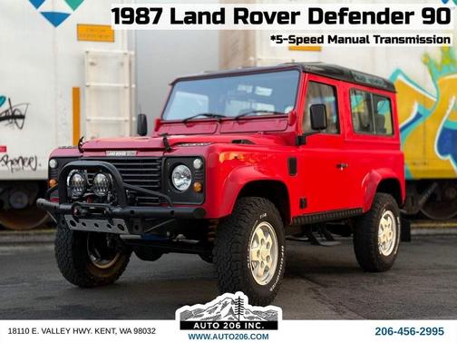 Red 1987 Land Rover Defender