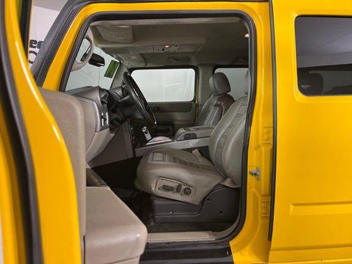 Yellow 2004 Hummer H2 Base