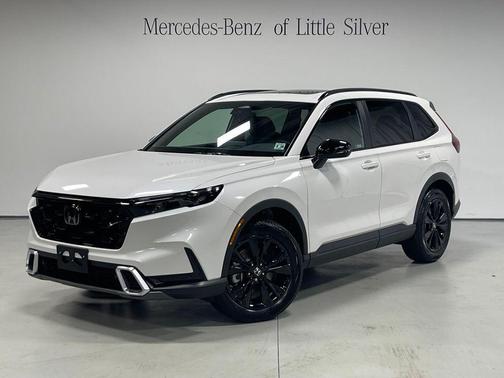 White 2026 Honda CR-V Hybrid Sport Touring AWD