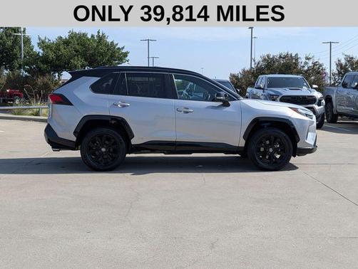 Silver Sky Metallic/Midnight Black Metallic 2023 Toyota RAV4 Hybrid SE