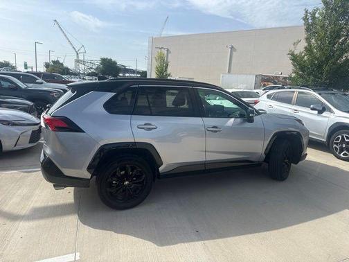 Silver Sky Metallic/Midnight Black Metallic 2023 Toyota RAV4 Hybrid SE