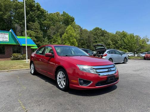 Red 2010 Ford Fusion SEL
