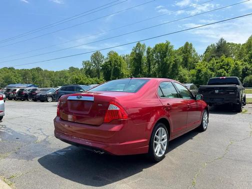 Red 2010 Ford Fusion SEL