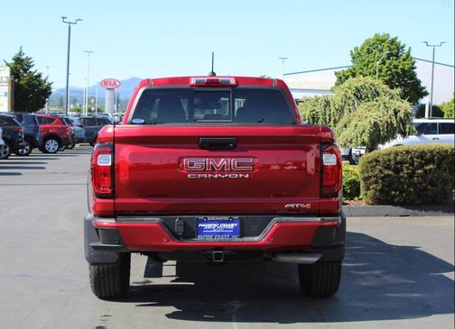 Volcanic Red Tintcoat 2023 GMC Canyon AT4