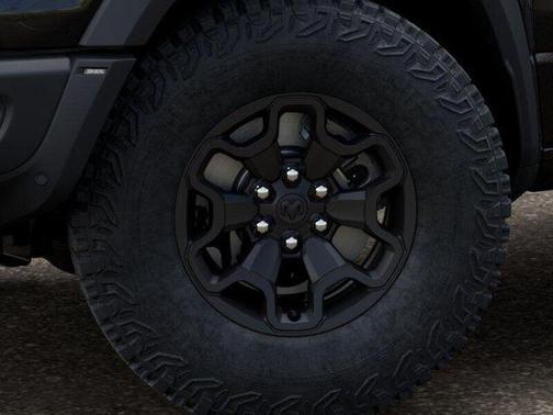 Diamond Black Crystal Pearlcoat 2026 RAM 1500 RHO Crew Cab 4x4 5'7' Box