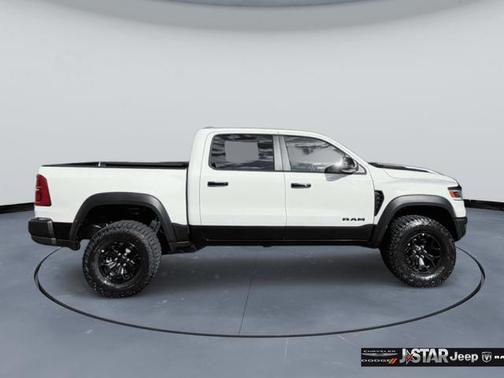 Bright White Clearcoat 2026 RAM 1500 RHO Crew Cab 4x4 5'7' Box