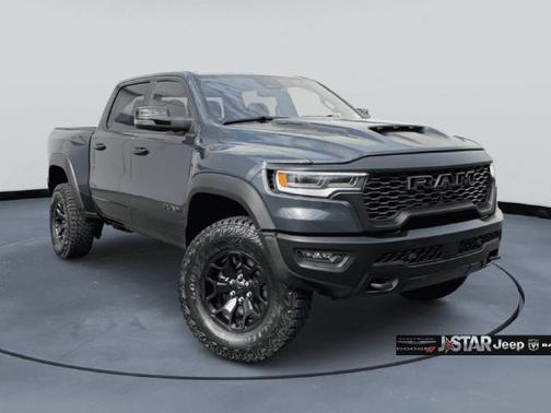 Blue Metallic 2026 RAM 1500 RHO Crew Cab 4x4 5'7' Box