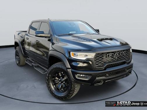 Diamond Black Crystal Pearlcoat 2025 RAM 1500 RHO Crew Cab 4x4 5'7' Box
