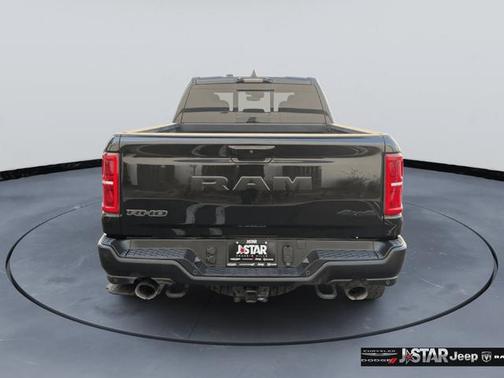 Diamond Black Crystal Pearlcoat 2025 RAM 1500 RHO Crew Cab 4x4 5'7' Box