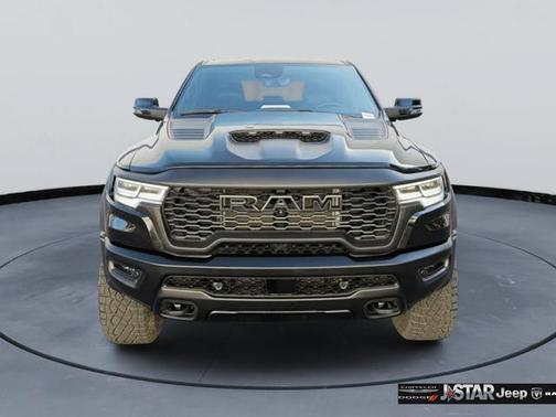 Diamond Black Crystal Pearlcoat 2025 RAM 1500 RHO Crew Cab 4x4 5'7' Box