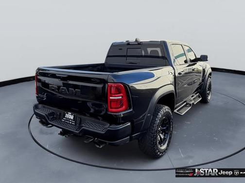 Diamond Black Crystal Pearlcoat 2025 RAM 1500 RHO Crew Cab 4x4 5'7' Box