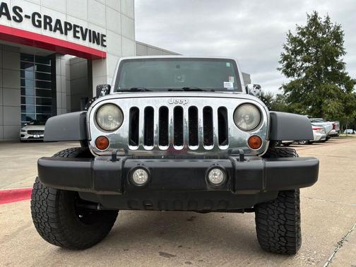 Bright Silver Metallic Clearcoat 2011 Jeep Wrangler Unlimited Sport