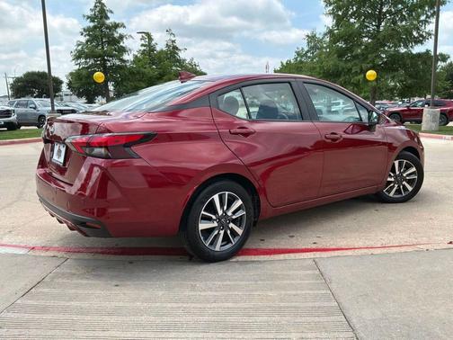 Red Metallic 2025 Nissan Versa 1.6 SV